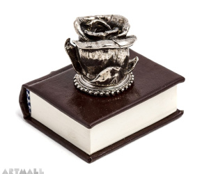 Metal decorated penstand on book reproduction. ROSE
